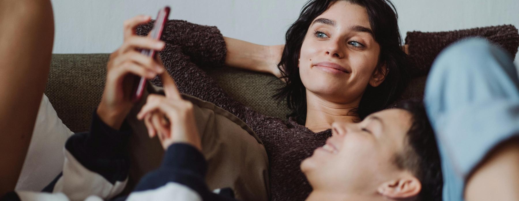 a person lying on a person's chest