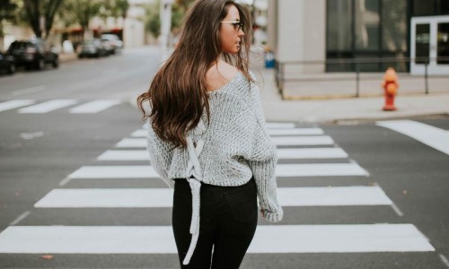 a person walking in a crosswalk